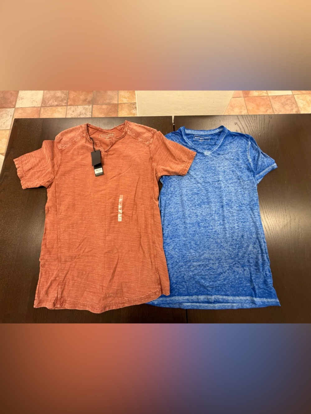 Two small men’s Buckle see shirts. One new with tags (shown in picture)